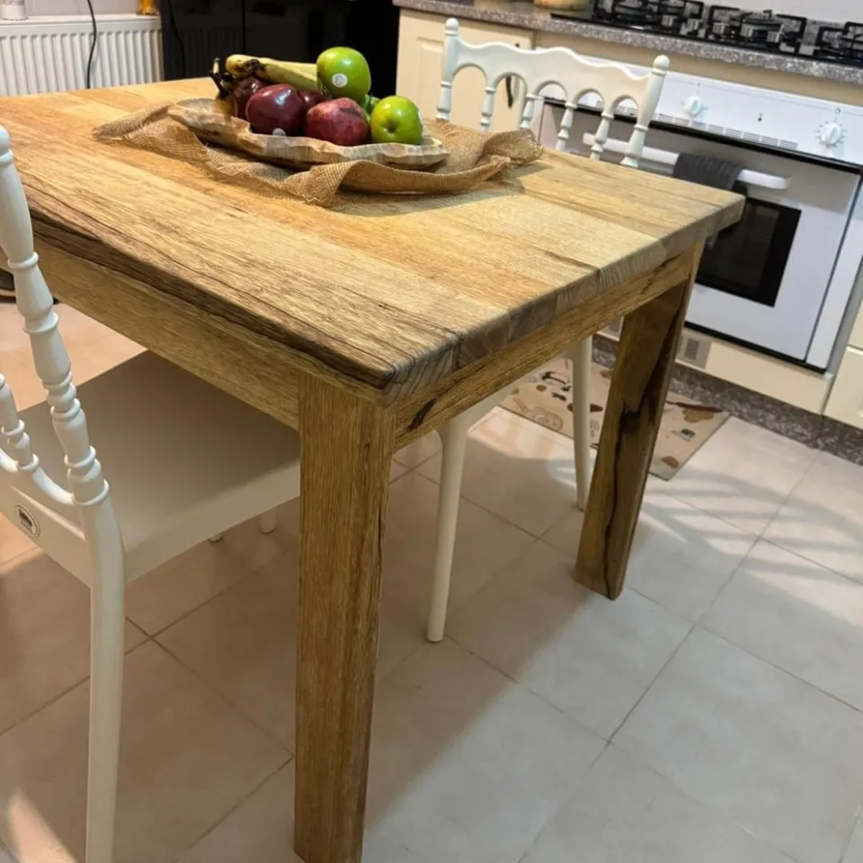 Limba wood table in a real kitchen setting - 1