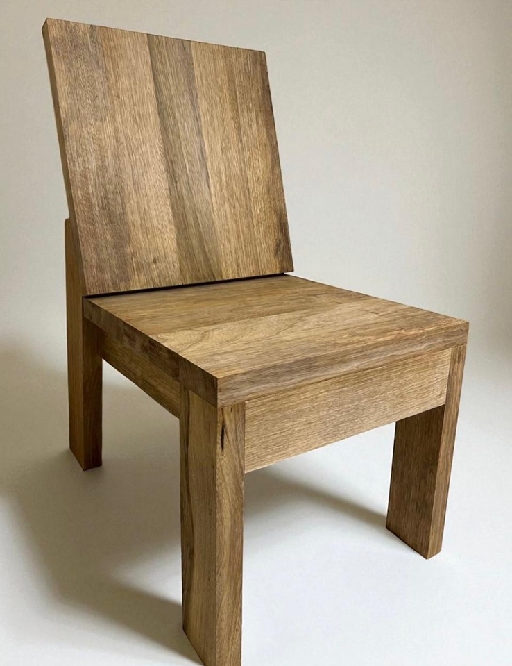 Full perspective view of a modern natural Limba wood chair - 1