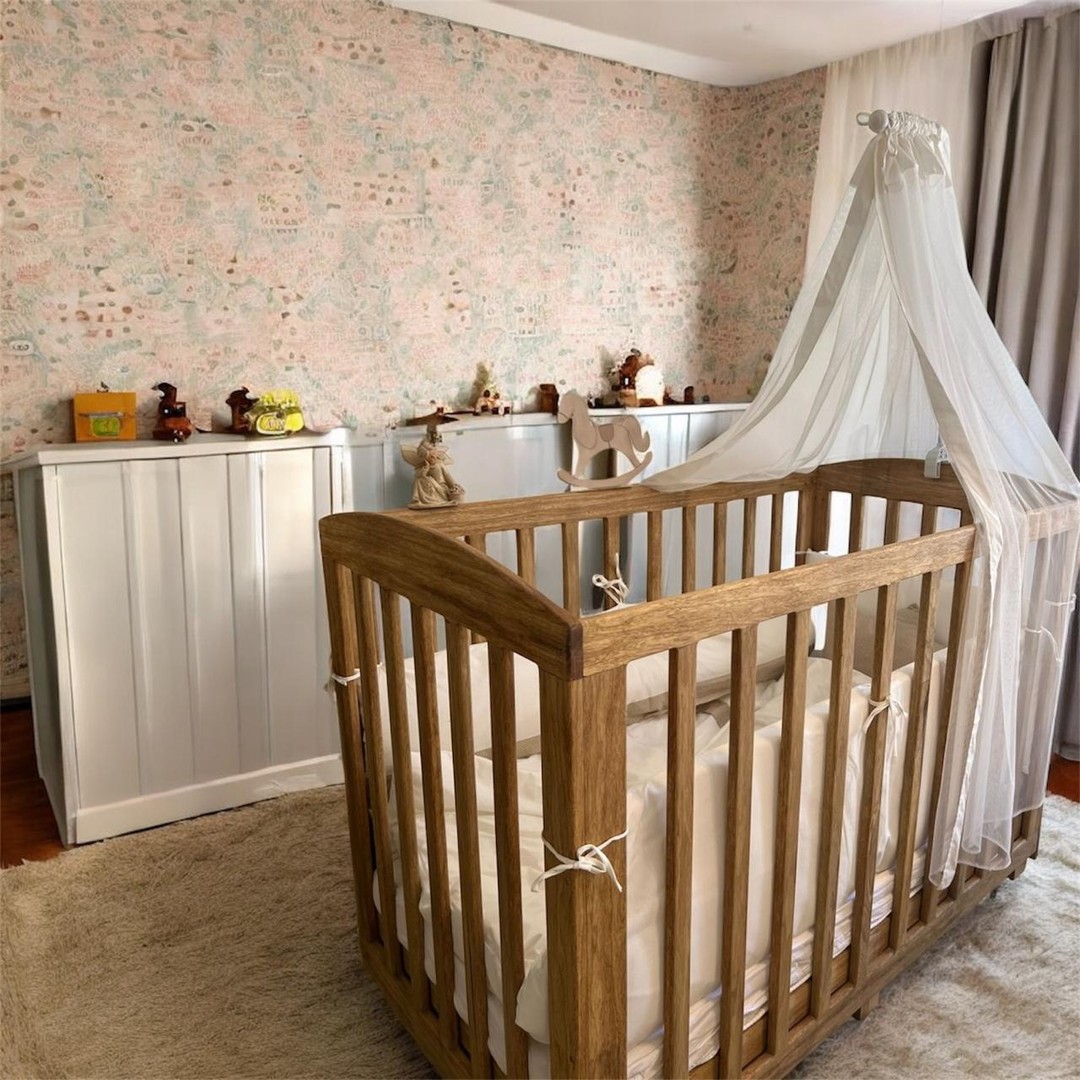 Natural Limba wood baby crib, showcasing its warm texture and modern design. - 1