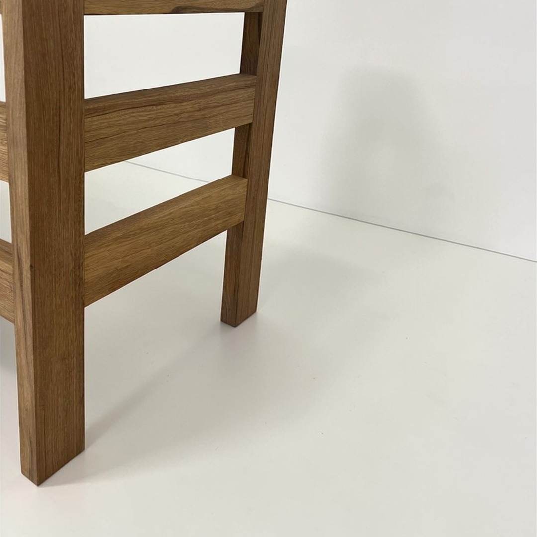Close-up of the sturdy side structure and legs of the wooden desk - 2