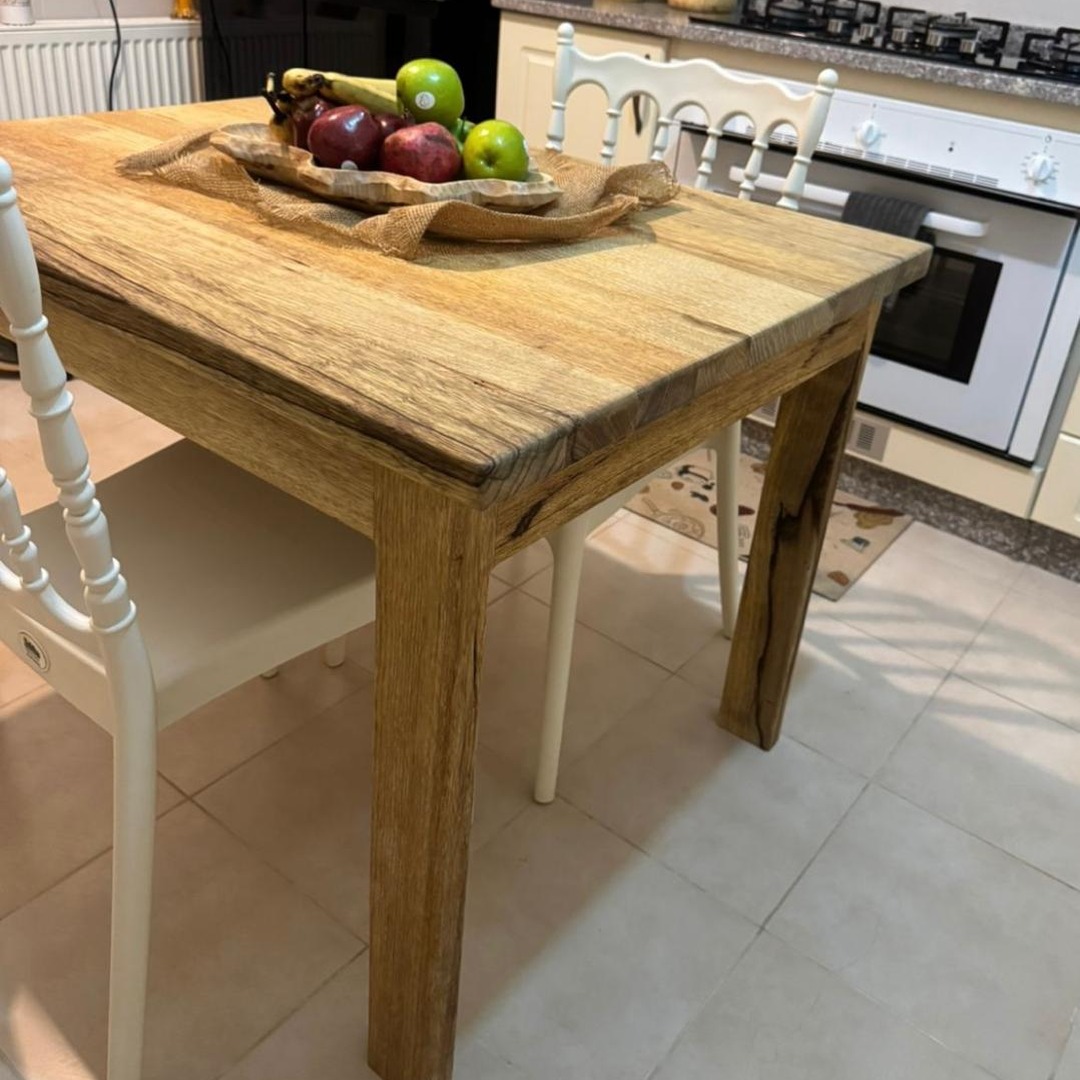 Limba wood table in a real kitchen setting - 1